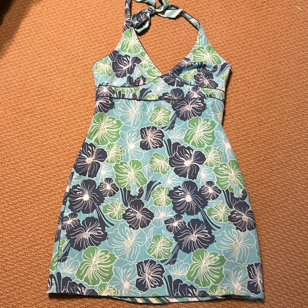 Reversible beach dress with halter tie and zipper.